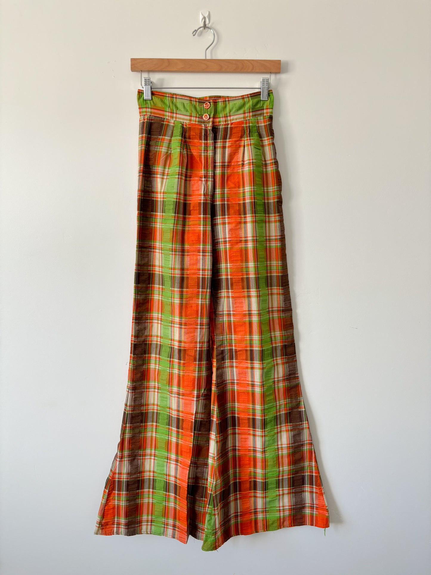 Orange plaid flare trousers